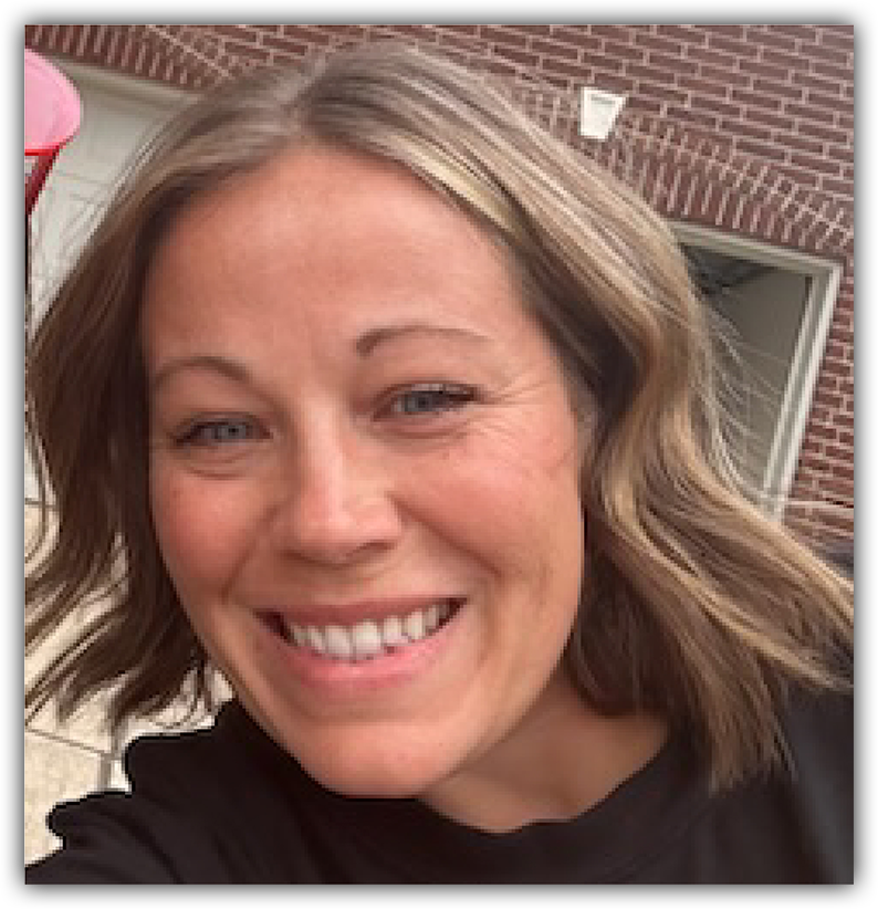 Woman with short hair wearing black shirt